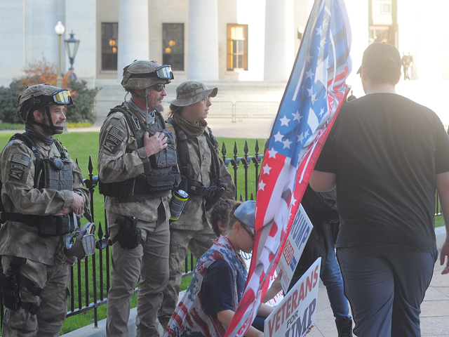 Members of the self-identified "Ohio State Regular Militia" appeared at the Statehouse on Nov. 7 to 'protect people' who came to celebrate Joe Biden's victory over President Donald Trump.