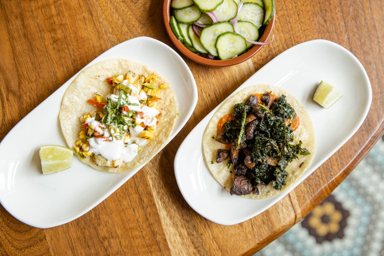 Baja fish taco with beer-battered mahi, cabbage, chipotle crema and the crispy kale and mushroom taco with roasted cremini and red mole