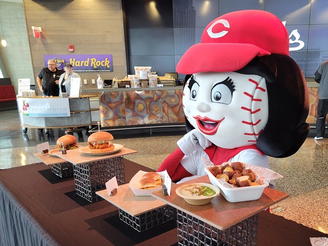 Rosie Red shows off Great American Ball Park's new menu items on April 5, 2022.