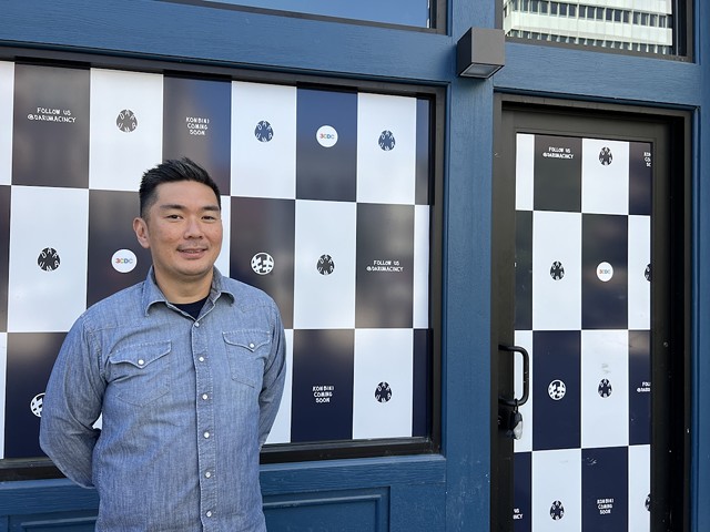Hideki Harada in front of the upcoming Japanese convenience store Daruma.
