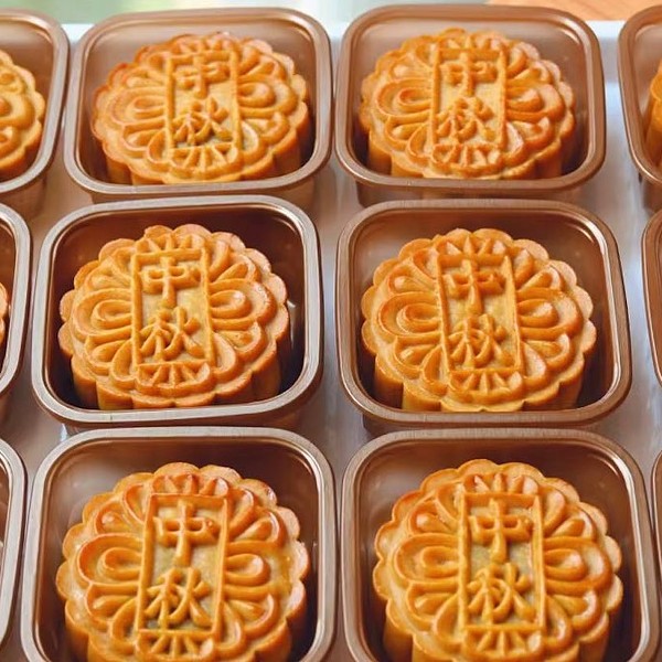 Mooncakes, a traditional Chinese dessert served during the Mid-Autumn Moon Festival, from Queens Bakery
