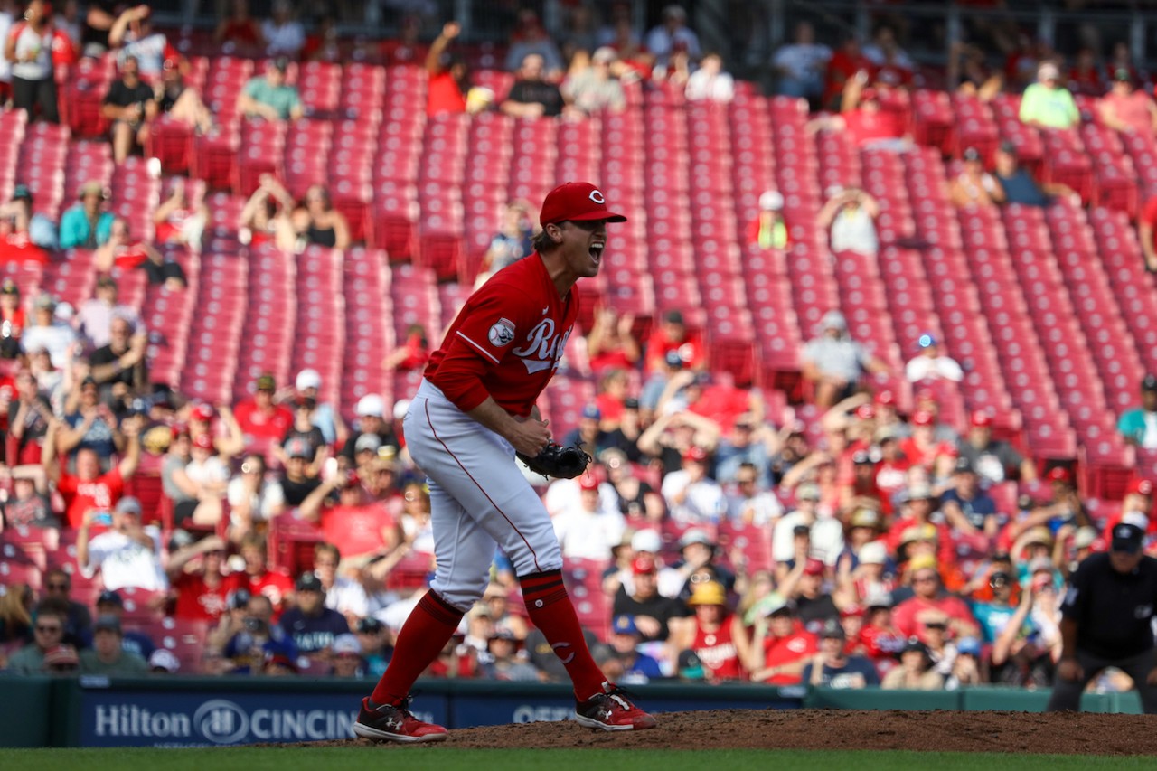 Lucas Sims strikes out Julio Rodríguez to end the top of the seventh inning during the Cincinnati Reds' game against the Seattle Mariners on Sept. 4, 2023.