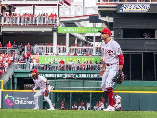(Left) Second baseman Jonathan India and first baseman Joey Votto play for the Cincinnati Reds at Great American Ball Park on April 12, 2022.