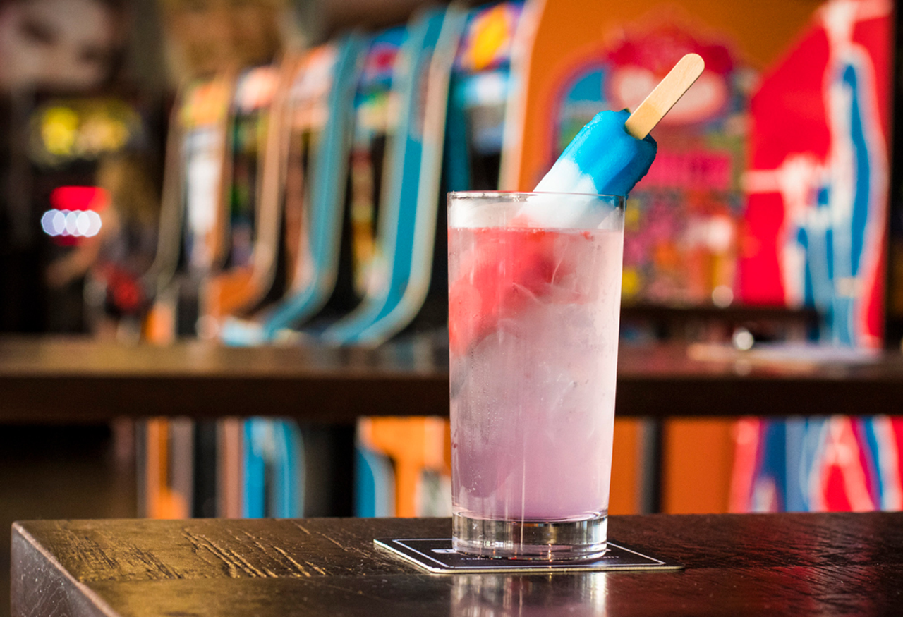 According to 16-Bit Bar + Arcade brand manager Bob Berley, "we love coming up with fun, new ways to infuse elements of nostalgia into our brand." In addition to their boozy Slush Puppies, the bar also offers a popsicle cocktail named Hulk Hogan made with vodka, lemonade and an Original Bomb Pop Popsicle.