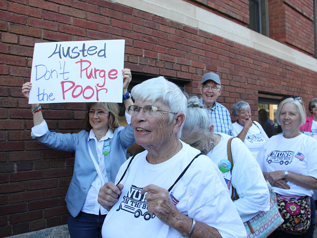 Nuns from a number of Cincinnati orders gathered outside the Hamilton County Board of Elections Sept. 13 to protest voter purges by the state.