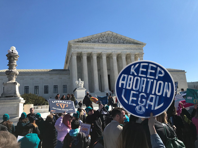 Abortion rights activists rally outside of the U.S. Supreme Court.