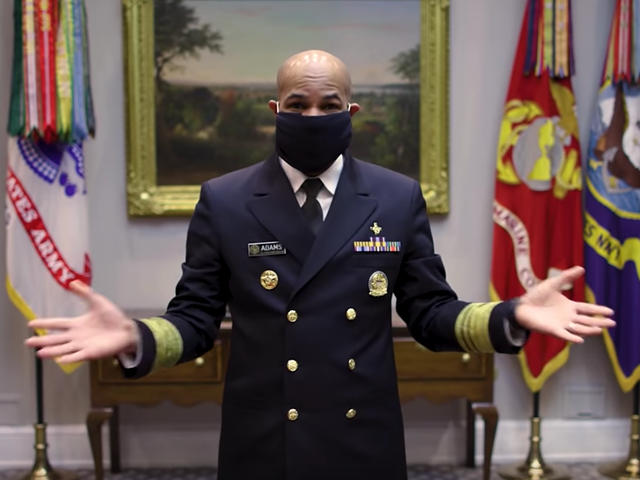 U.S. Surgeon General Dr. Jerome Adams in a video from the CDC showing how to make a no-sew cloth face mask