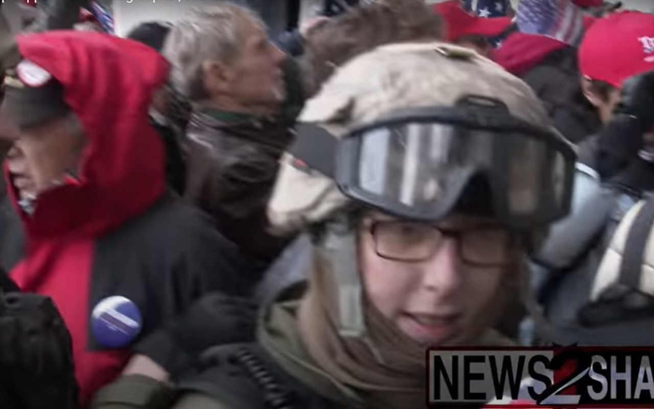 A still from footage of the Jan. 6, 2021, attack on the U.S. Capitol in Washington D.C. captures Ohio resident Jessica Watkins, 38, seen with several people in Oath Keepers regalia, heading up the Capitol stairs.