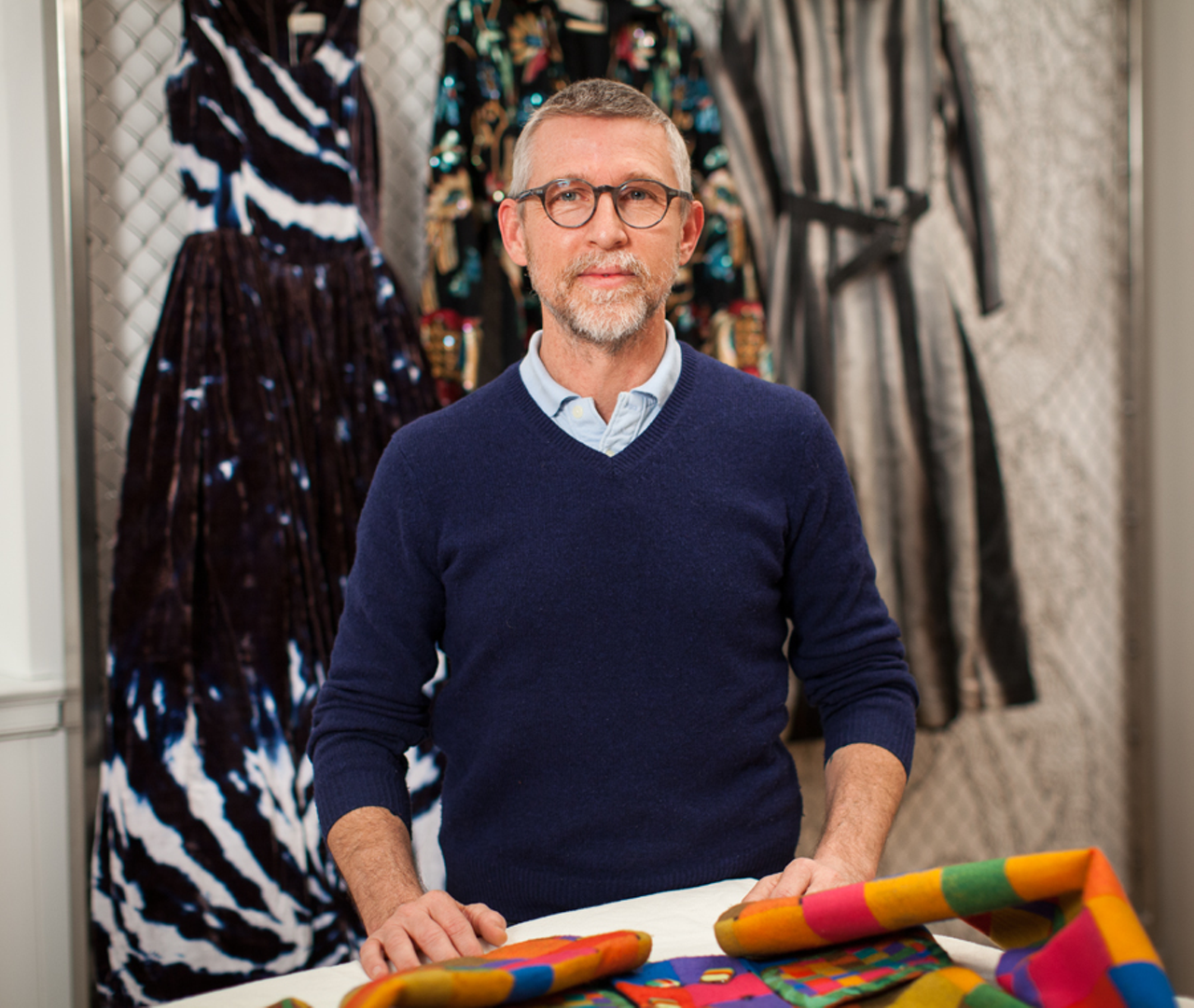 Oldham with some of his gifts to the RISD Museum's costume and textiles collection