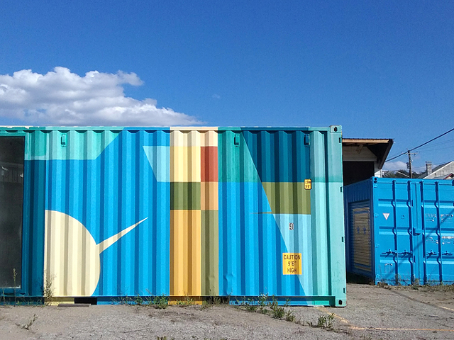 A colorful storage container serves as an art gallery in Northside.