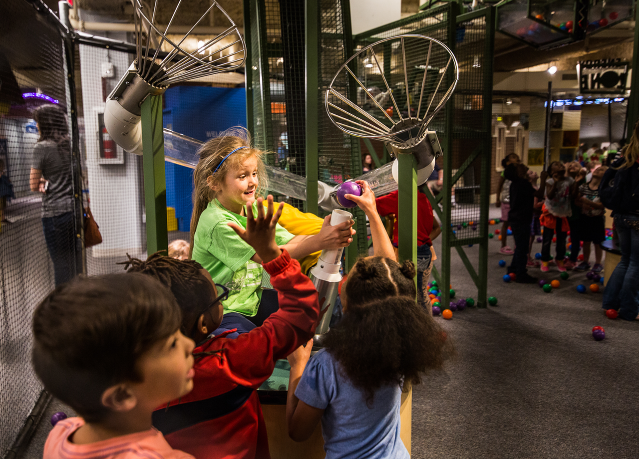 Children interacting with machines inside of the Energy Zone
