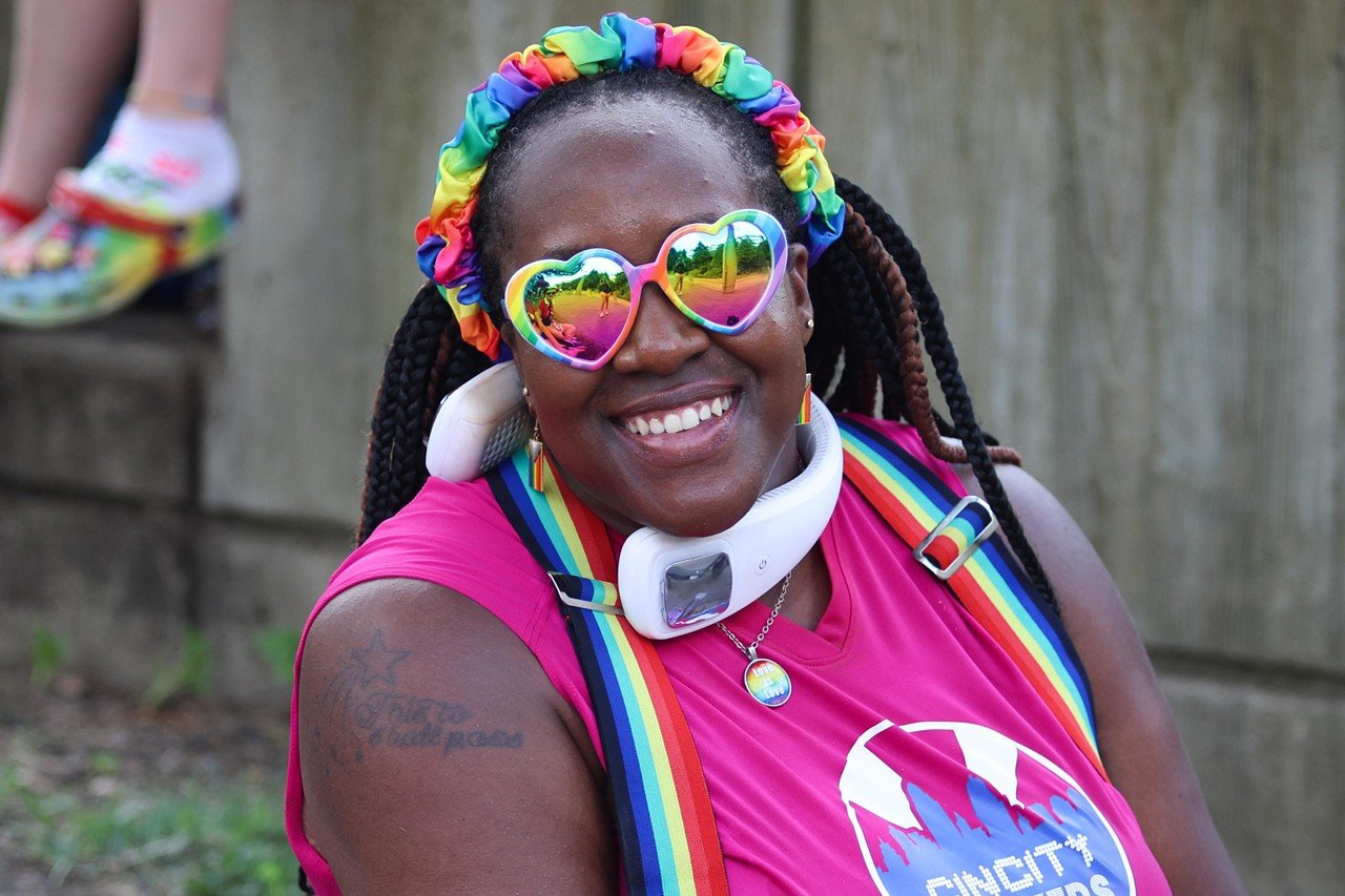 A woman smiles at the Pride festival on Saturday, June 22, 2024.