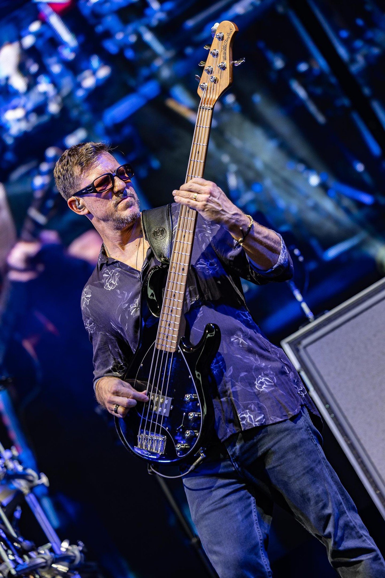 Bass guitarist for the Dave Matthews Band, Stefan Lessard, plays at Ruoff Music Center on Friday, June 28, 2024.