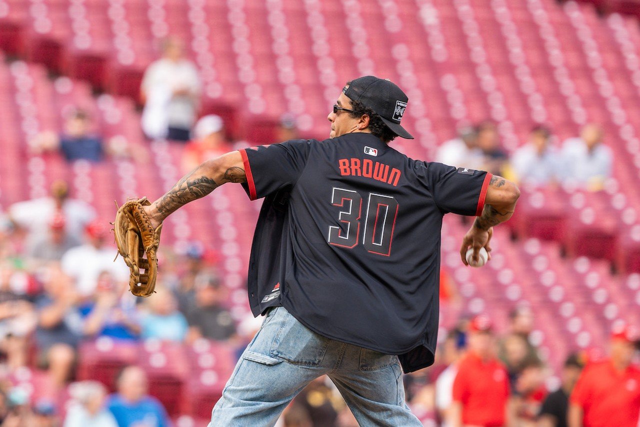 Bengals running back Chase Brown throws out first pitch at the Cincinnati Reds' May 22 game.