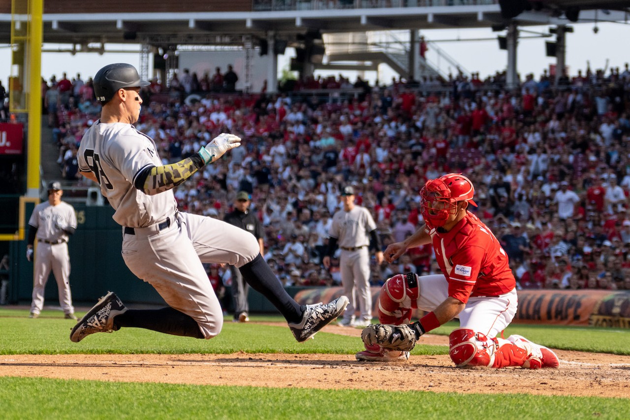 Luke Maile tags out Aaron Judge during the 5th inning of the game against the New York Yankees on May 20, 2023.