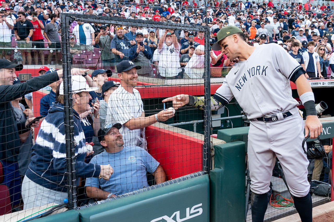 New York Yankees player Aaron Judge greets Pete Rose during the Cincinnati Reds game against the Yankees on May 20, 2023.