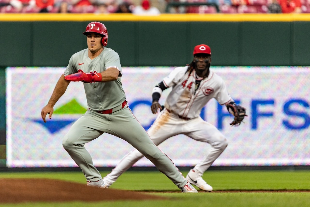 Elly De La Cruz lunging toward a ball while the runner advances to third base | Cincinnati Reds vs. Philadelphia Phillies | April 22, 2024