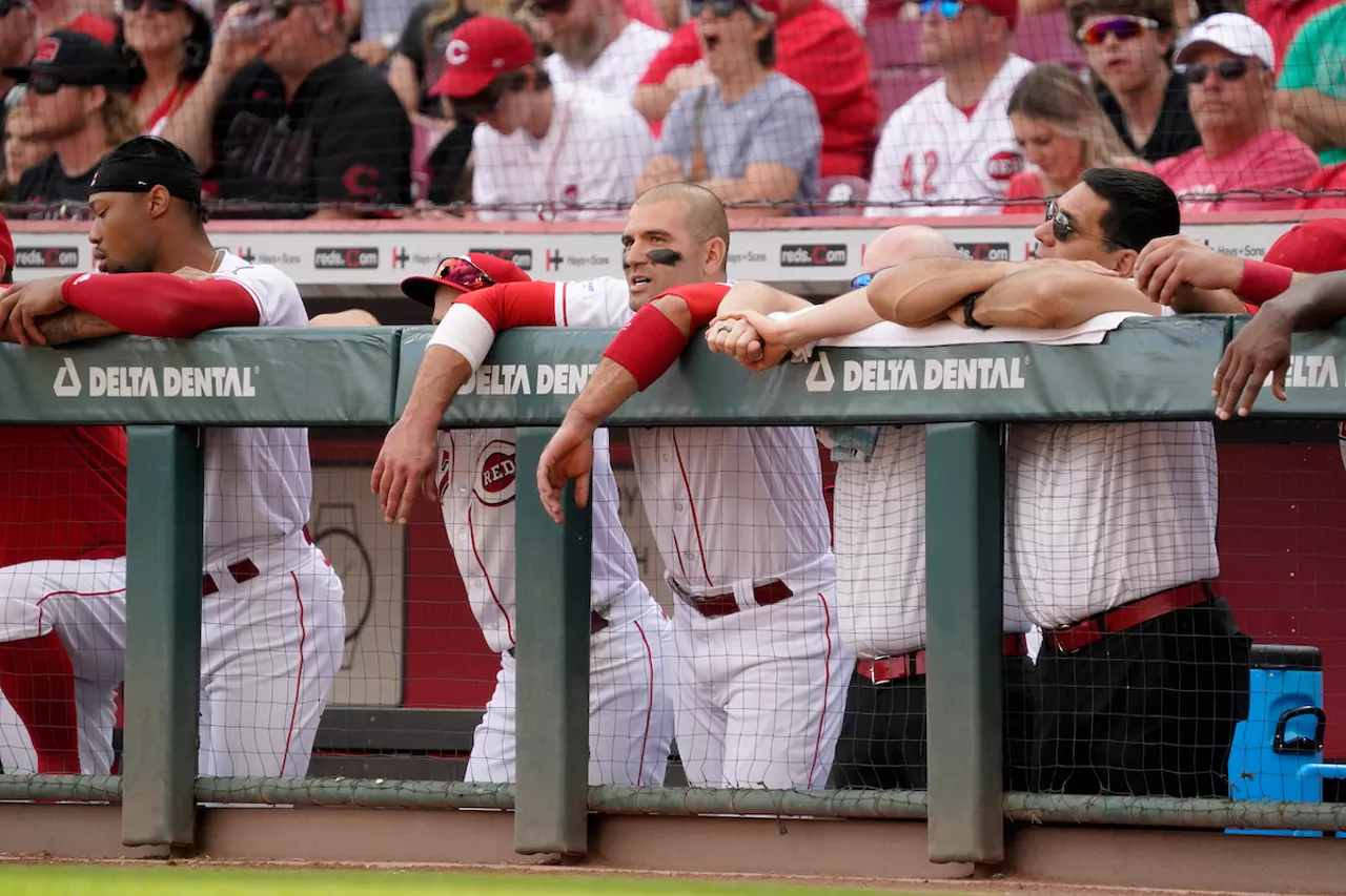 Joey Votto hanging out in the stands with Reds fans while out with