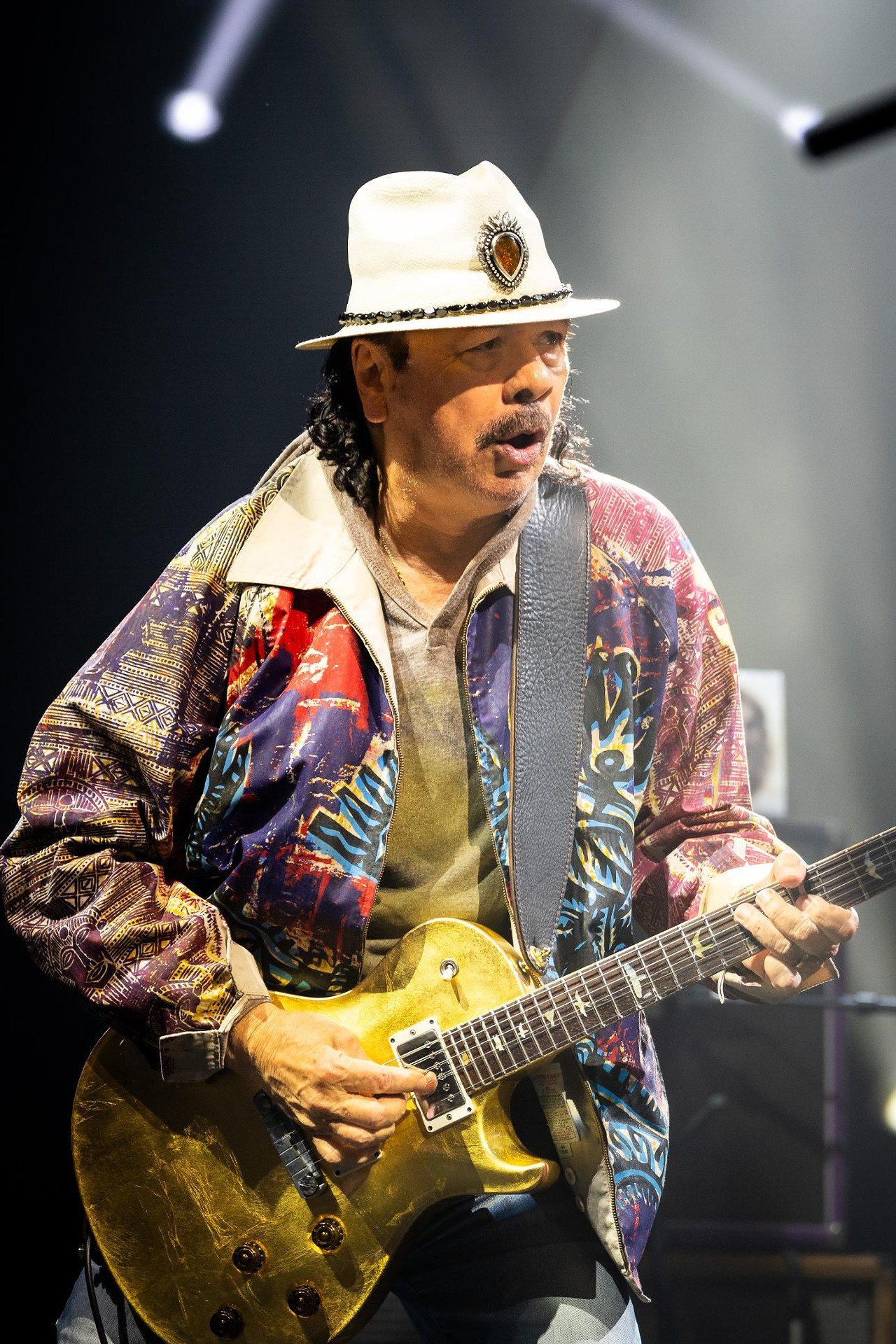 Lead singer of Santana, Carlos Santana, plays at Riverbend Music Center on Friday, June 28, 2024.