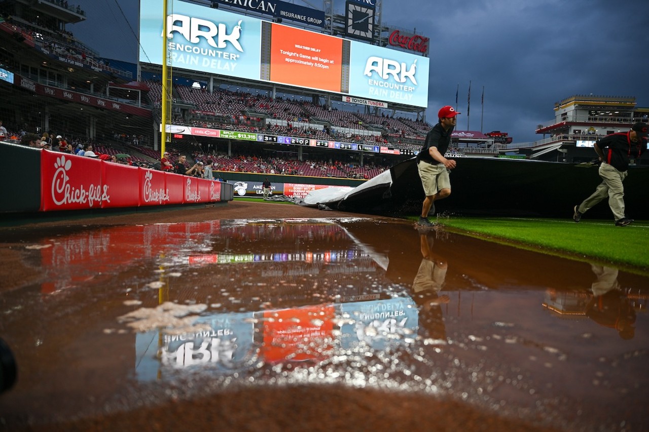 Cincinnati Reds crew pull the tarp off the field after a two-hour rain delay | Cincinnati Reds vs. Baltimore Orioles | May 3, 2024