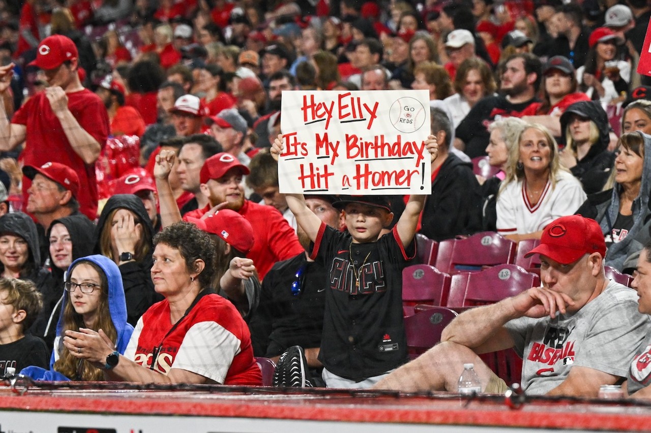 A young fan holds a sign | Cincinnati Reds vs. Baltimore Orioles | May 3, 2024