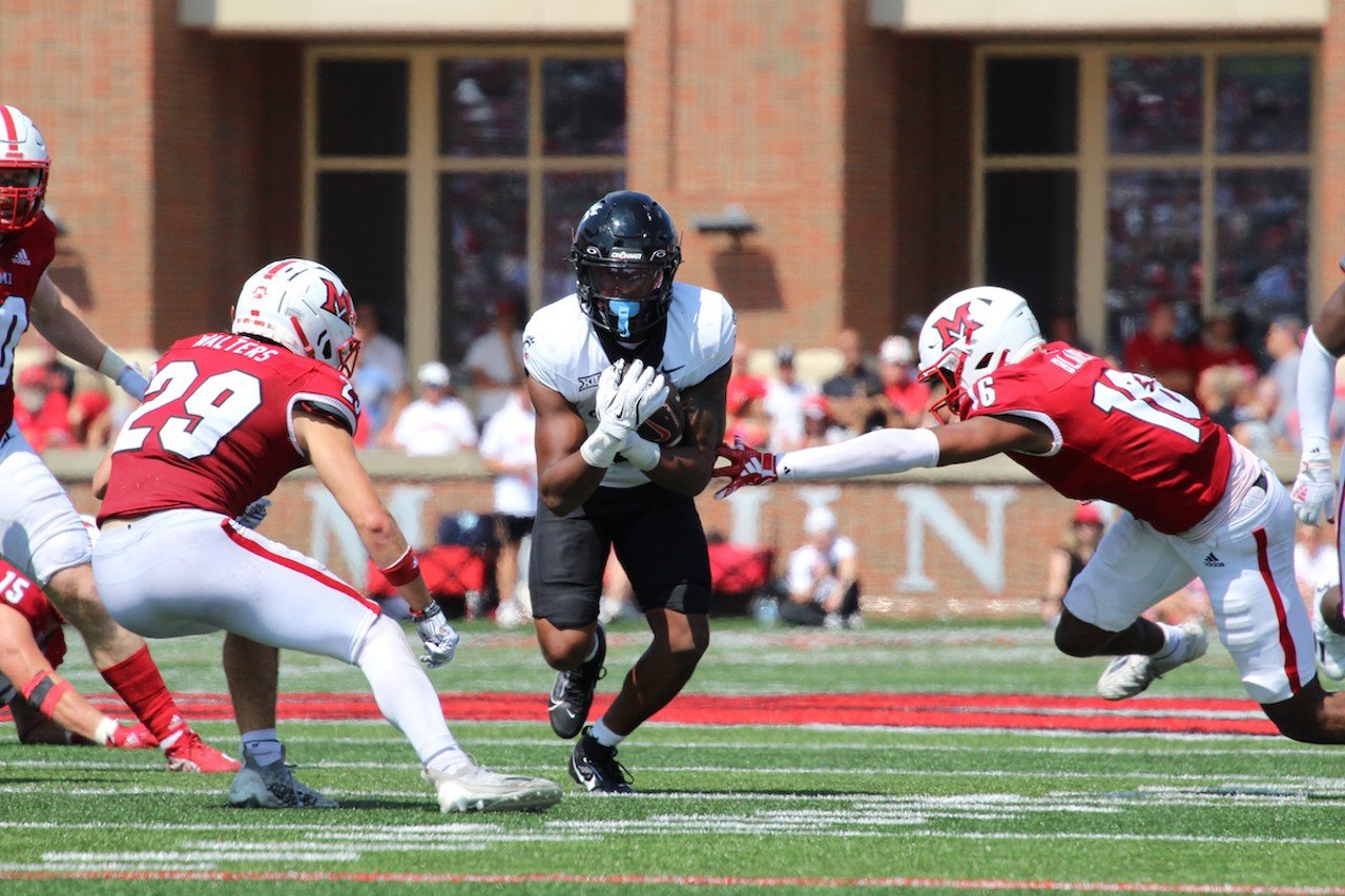 UC running back Evan Pryor runs the ball.