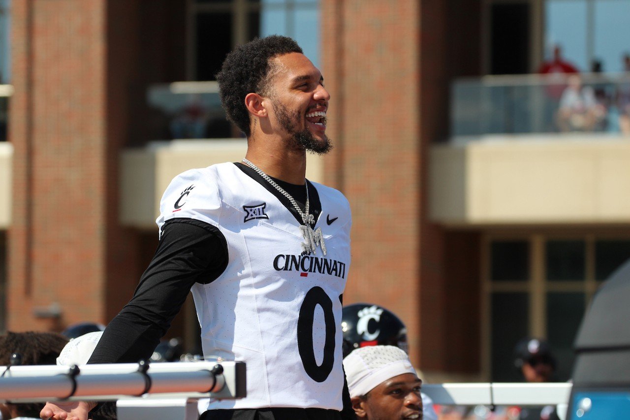 UC defensive back Josh Minkins reacts to heckling from Miami fans.