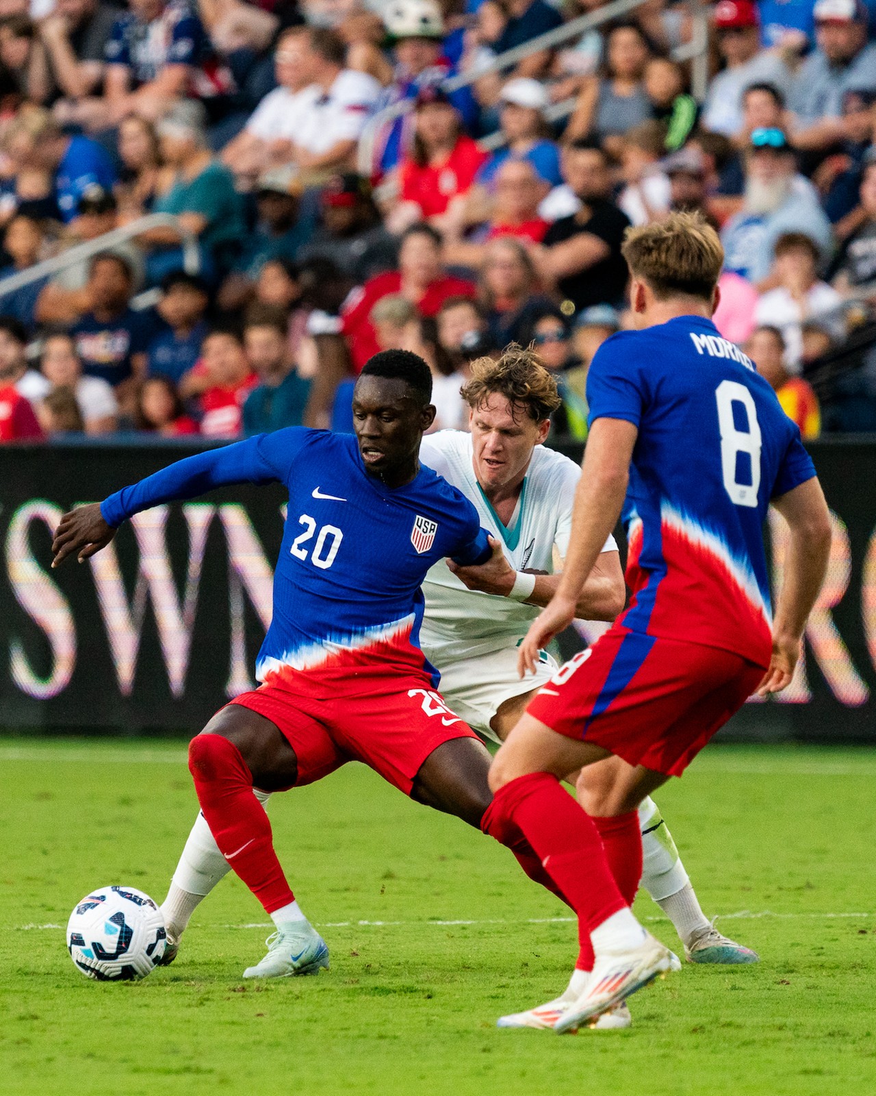 Folarin Balogun tries to dribble out of coverage.