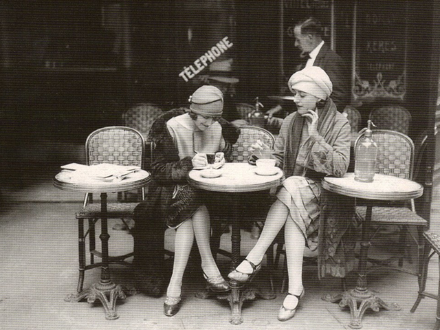 A picture of a postcard of two French flappers, circa 1920s.