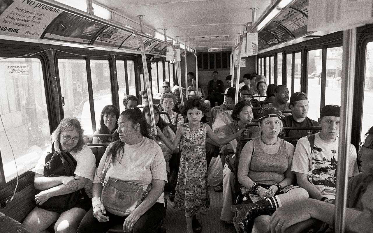 In a four year span, Wing Young Huie photographed  thousands of people in the 15 neighborhoods connected by Lake Street, which connects the trendiest places in Minneapolis to the poorest. Eventually, the project became a six-mile gallery displayed in storefronts, bus stops, etc. Some subjects in the photos told their stories to Young, which were depicted beside the pictures.