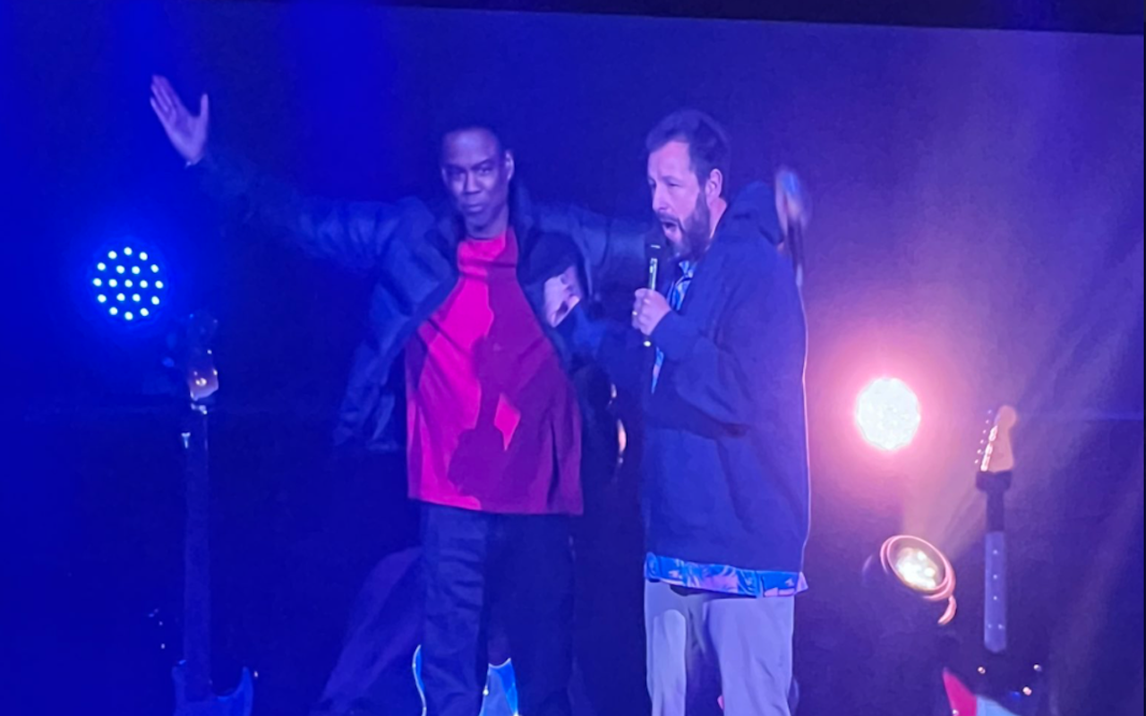 Chris Rock (left) joins Adam Sandler during Sandler's comedy tour stop at Heritage Bank Center in Cincinnati on Feb. 6, 2023.