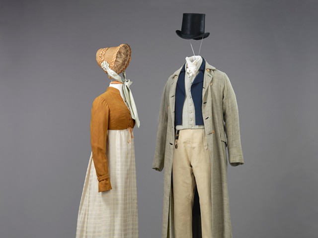 Left: Dress, Spencer, and Bonnet, Pride and Prejudice, 1995, Simon Langton, director. Worn by Jennifer Ehle as Elizabeth Bennet. Dinah Collin, costume designer. Right:
Duster, Tailcoat, Breeches, Shirt, and Top Hat, Pride and Prejudice, 1995, Simon Langton, director. Worn by Colin Firth as Mr. Fitzwilliam Darcy. Dinah Collin, costume designer.
