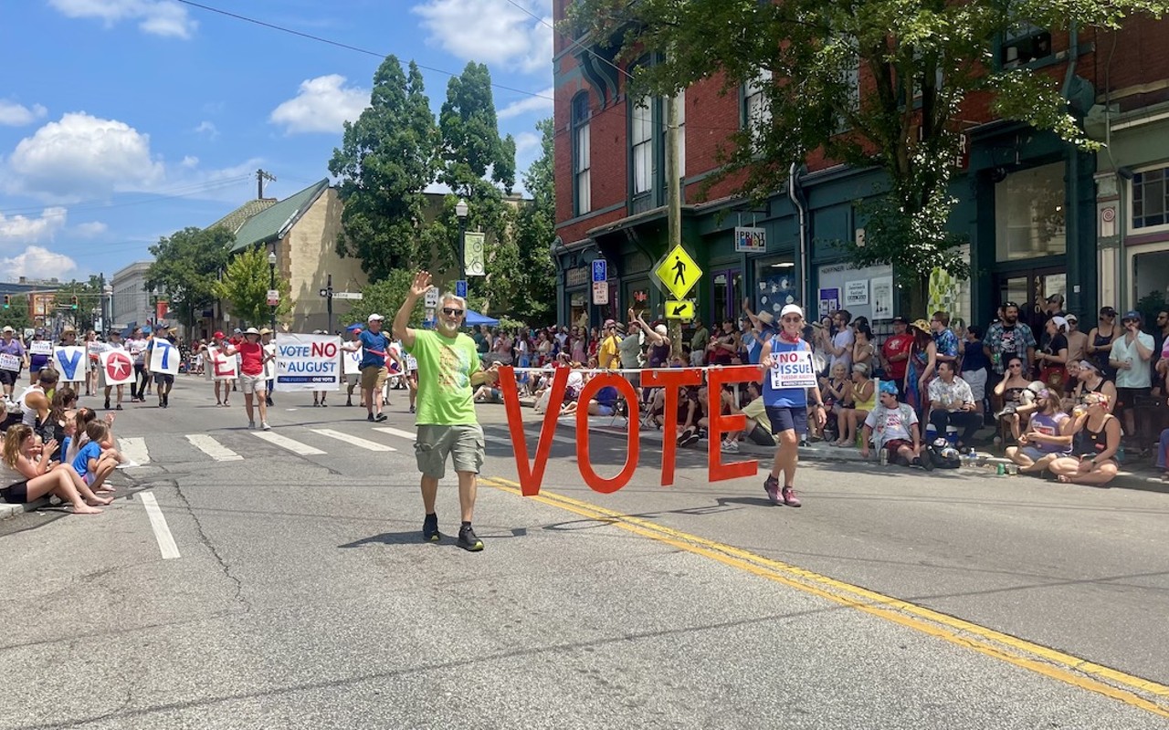 Pro-abortion rights organizers encourage voters to vote 'NO' on Issue 1 during the 2023 Northside 4th of July Parade.