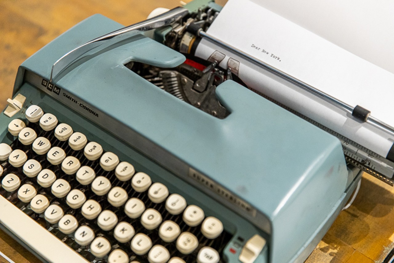 A typewriter on the work table's desk
