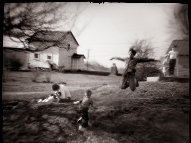 "Boys Flying, Amesville, Ohio." (1976)