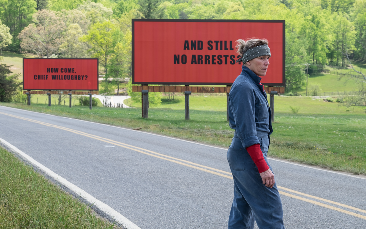 McDormand in front of two of the billboards