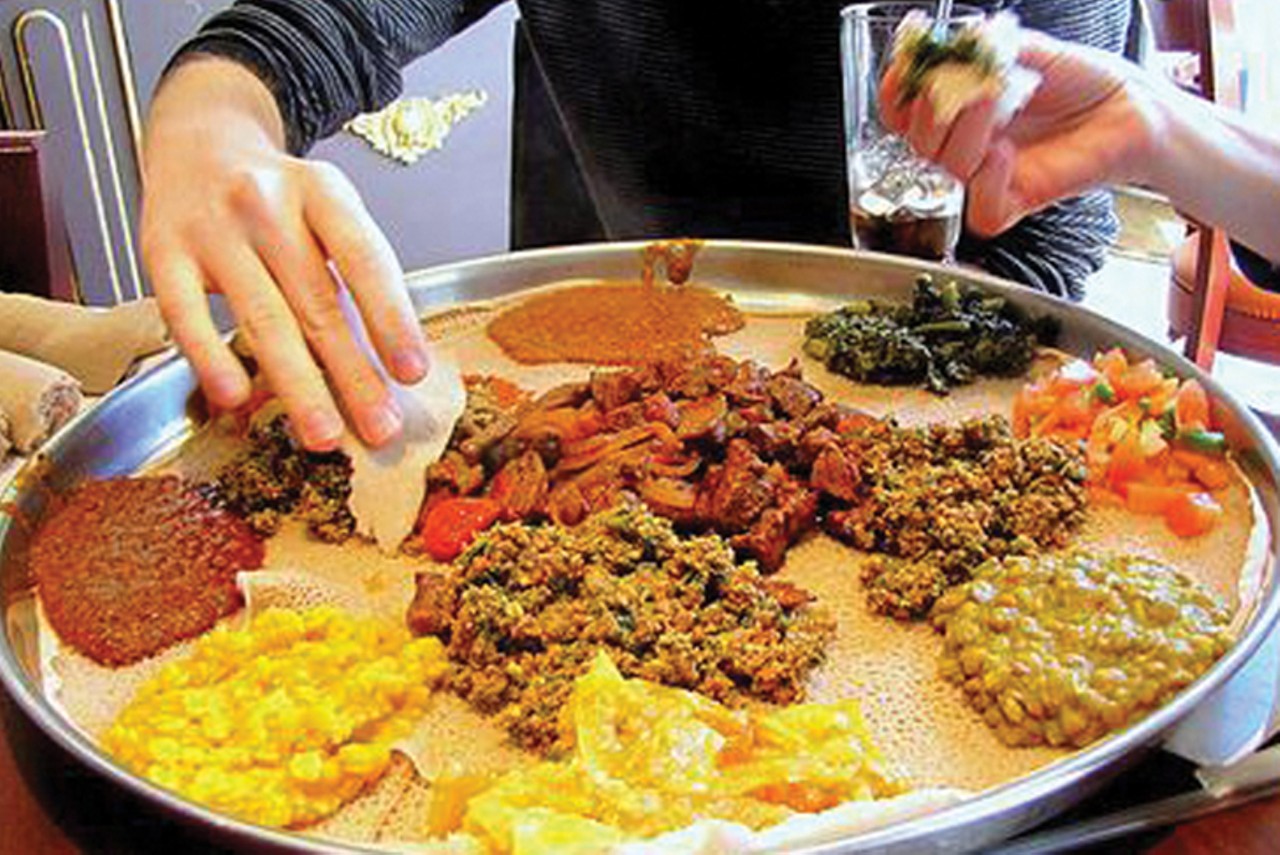Elephant Walk
170 W. McMillan St., Clifton
Clifton&#146;s Elephant Walk Injera & Curry House does double duty as both an Indian and Ethiopian restaurant. The double-sided menu features cuisine from both countries, which have somewhat similar flavor profiles. If you&#146;ve never eaten Ethiopian food, it&#146;s kind of like Indian &#151; both countries offer stew-style dishes consisting of ingredients like chicken, lentils, cabbage and lamb, but Ethiopian dishes also rely heavily on beef, which you won&#146;t see in Indian cuisine. The restaurant also offers a genius daily lunch buffet with both styles of international eats for customers to mix, match and try a bit of both. Slap some saag on a plate with a little doro wat and see which you prefer. 
Photo: CityBeatarchives