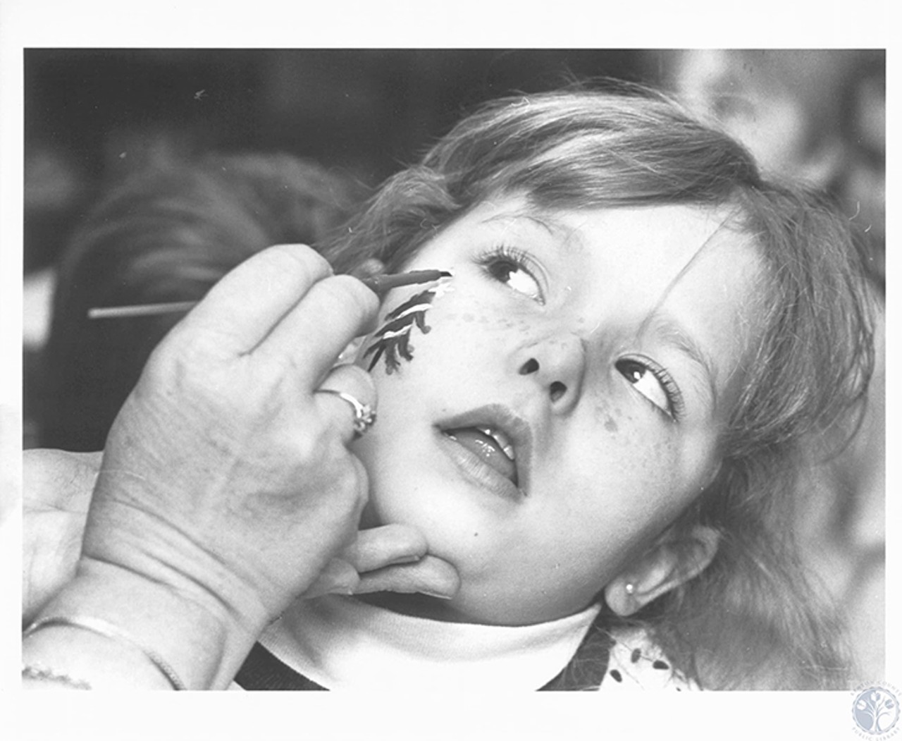 Covington, 1991
"Mary Courtney (7) gets Christmas tree painted on at Christmas party in Devou Park"