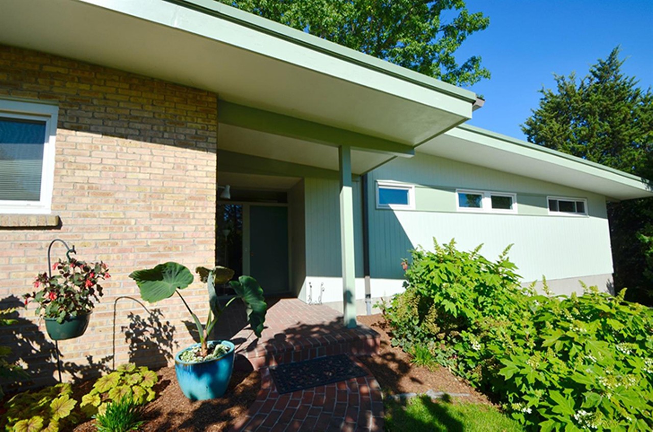 This Carl Strauss-Designed Midcentury Modern Home in North Avondale Has a Victorian Greenhouse