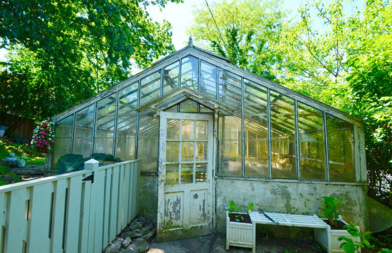 This Carl Strauss-Designed Midcentury Modern Home in North Avondale Has a Victorian Greenhouse