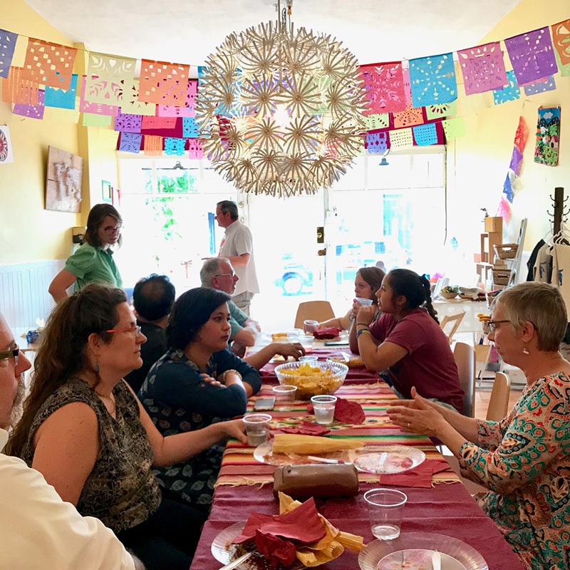 Women gather at a Welcome Project lunch. - Photo: Provided