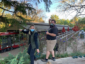 Staff and volunteers hanging lights - Photo: Provided by the Cincinnati Zoo
