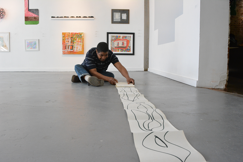 Curtis Davis working on one of his pieces - Courtesy of V + V