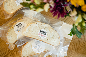 Share: Cheesebar's take-and-bake grilled cheeses - Photo: Hailey Bollinger