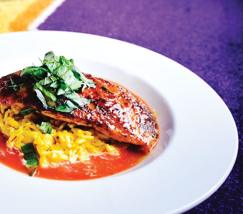 Voodoo Salmon and other Southern-inspired suppers pepper the menu at Purple Poulet.