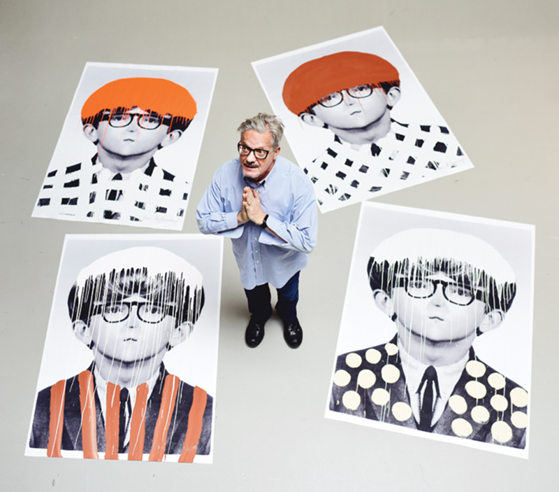 Mark Mothersbaugh stands among works that feature his altered high-school yearbook photo.