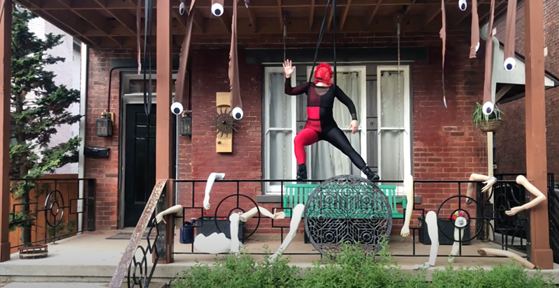 Northside Aerial Artist Uses Haunting 'ScareCorona' Porch Performance to Frighten Off COVID-19
