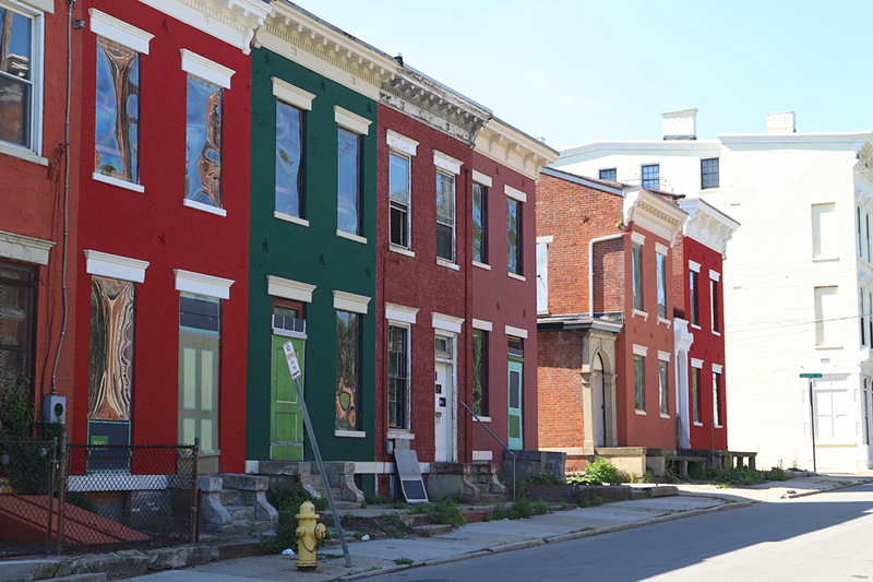 Rowhouses on Baymiller Street in the West End stabilized by the Greater Cincinnati Redevelopment Authority. - Nick Swartsell