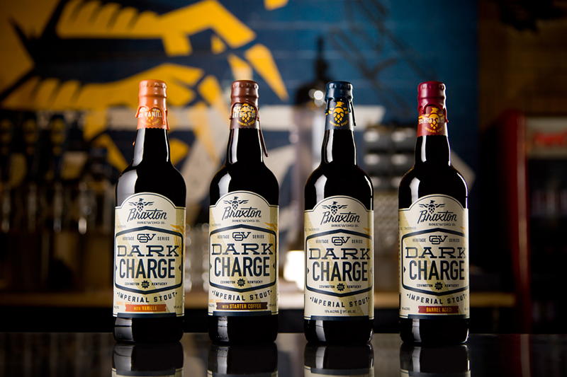 Bottles of previous Dark Charge releases - Photo: Provided by Braxton