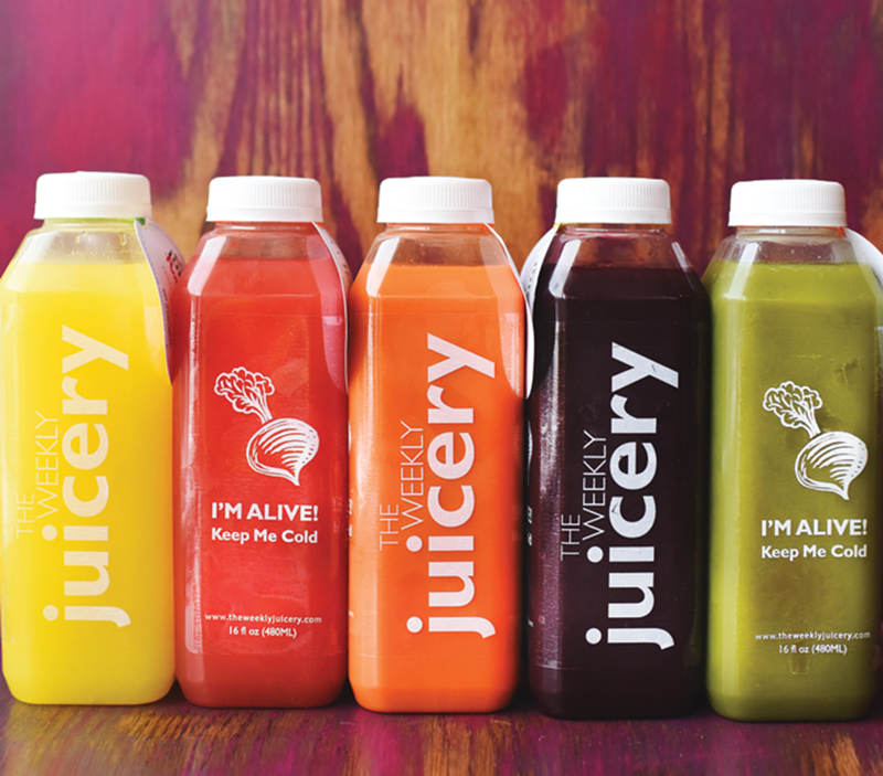 The Weekly Juicery's rainbow assortment of cold-pressed juices.